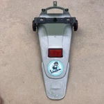 2009 Genuine Scooter Buddy 150 License Plate Bracket Rear Mud Guard Fender. Fixed Price $10.00.