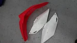 Honda Oem Left Side Cover 13-17 CRF450R Number CRF250R Right Front Fender Plate. Fixed Price $45.00.