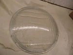 KNUCKEL-UL-45 "repro" Headlight Lens #67731-35. Fixed Price $25.00.