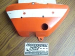 Suzuki 71-72 TS125 TC125 Left Side Oil Tank Cover Strip Orange Oem. Fixed Price $43.50.