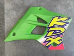 Kawasaki 1997 KDX200 Oem Right-side Radiator Shroud #49089-1121. Fixed Price $213.21.