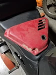 1976 - 1980 Kawasaki Left Side Oil Tank Cover. Fixed Price $39.00.
