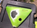 74 Kawasaki Ks 125 Left Side Panel, 36001-049-4A. Fixed Price $50.00.