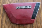 1974, 1975, & 1976 Kawasaki KZ400 Right Side Cover With Badge. 36007-053-4G.. Fixed Price $29.48.