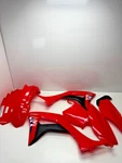 New 2026 Oem Honda Red Plastic Kit Fender Plate 19-26. Fixed Price $360.00.