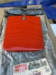 Yamaha Nos 80 Tail Battery Cover Oem Red Lid 2AL-W217E-00. Fixed Price $649.00.