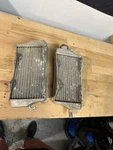 2000 Honda CR125R Radiators Set Left+right Slightly Bent Used 2STROKE. Fixed Price $40.00.