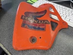 Honda Oem Left Radiator Side Cover 81-85 CR250 19072-KA4-730. Fixed Price $39.99.