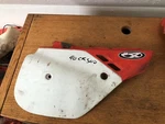 89 Honda CR-125,250,500R Right Side Panel, 83520-KS7-831ZA. Fixed Price $49.00.