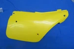 Nos Suzuki Right Hand Sidecover, 1987 RM125, 1986 RM250 Still In Factory Bag. Fixed Price $149.95.