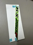 New Oem Kawasaki KX250F Side Cover #56054-0318. Fixed Price $14.99.