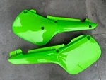 Kawasaki KX60 Oem Used Frame Cover Set #36001-1398 #36001-1399. Fixed Price $257.44.