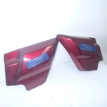 Left Right Side Cover Velocity Red Sunglo 57200071DZT Harley Touring '09-'23. Fixed Price $168.00.