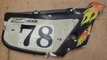 Suzuki DS80 1983-91 Oem Right Side Rear Cover 47111-03400 4FL. Fixed Price $125.00.