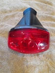 Triumph Bonneville T100 Rear Fairing Light Genuine. Fixed Price $100.76.