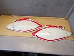 Honda CR125R 250R 2002-07 Side Cover Set 83610-KZ4-J41ZA & 83510-KZ4-J41ZA. Fixed Price $33.08.