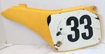 1986 Suzuki RM250 Side Panel Plastic 47211-01B00-25Y. Fixed Price $65.00.