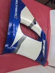 1999-2002 Yamaha YZFR6 Panel Assemblly Right Side Mid Cowling Blue/white. Fixed Price $65.00.