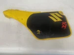 1986-1987 Suzuki Right Side Frame Cover Yellow Plastic Guard. Fixed Price $125.00.