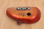 1973 Suzuki TC100 Left Side Cover / Panel Pt# 47111-25300-019. Fixed Price $69.00.